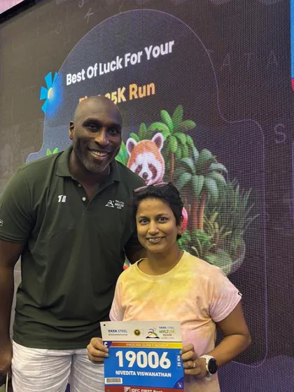 A GRR member meeting legendary sprinter Sol Campbell at the Tata Steel 25K Kolkata expo.
