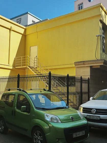 Finding interesting color combinations on the streets of Baku. This vibrant contrast of yellow and green caught my eye.