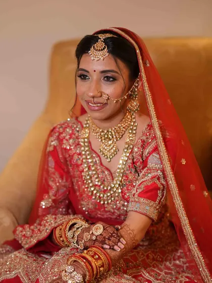 A close up on her beautiful smile and the intricate jewelry that we complemented with a classic makeup look.