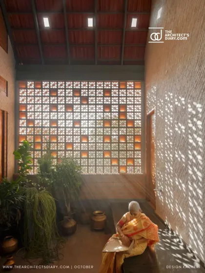 The beautiful light filtering through the courtyard's jali screen, as featured in The Architect's Diary.