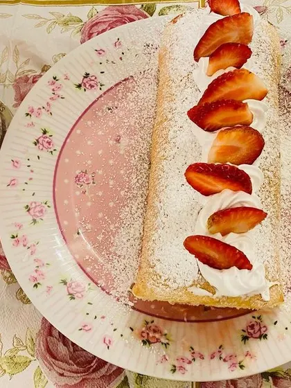 I love celebrating the seasons with my baking. This is a delicious strawberry jam Swiss roll, made with fresh strawberries and light whipped cream.