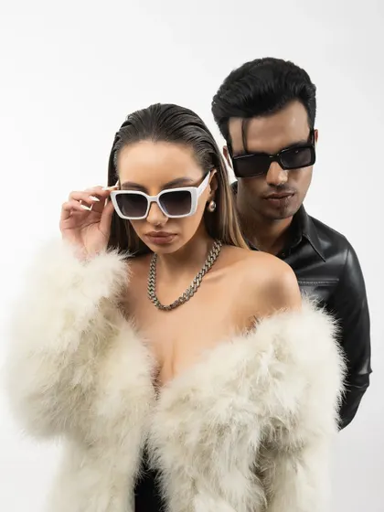 A high-fashion studio concept shoot featuring a male and female model styled in leather and fur. This image demonstrates my ability to direct and capture powerful, editorial-style visuals with dynamic posing and professional lighting.