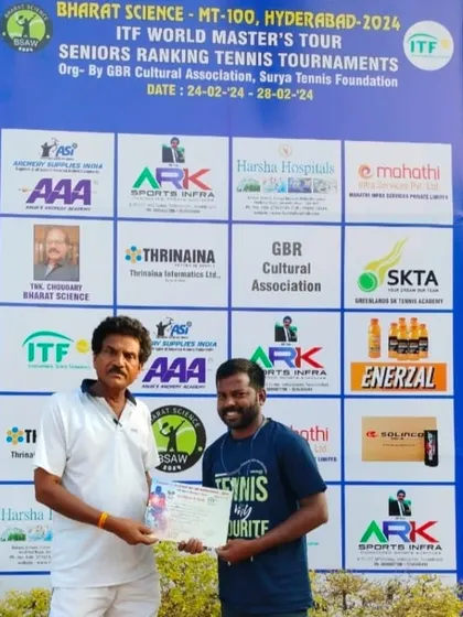 Receiving my finalist certificate at the ITF World Masters Tour. Continuous participation in tournaments keeps my coaching skills sharp and relevant.