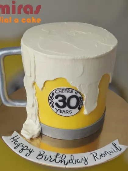 Cheers to 30 years! This beer mug cake is another great example of a fun, themed cake for an adult birthday, complete with frothy white frosting on top.