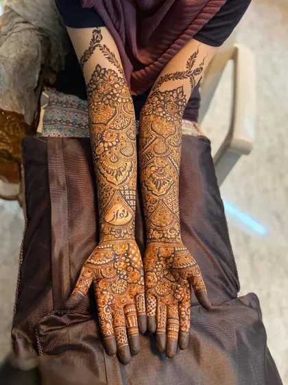 Both arms of the bride, showcasing the complete, symmetrical design.