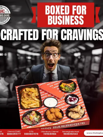Boxed for business, but crafted for cravings. This fun image captures the excitement of receiving a delicious, multi-course meal right at your desk, breaking the monotony of the workday.