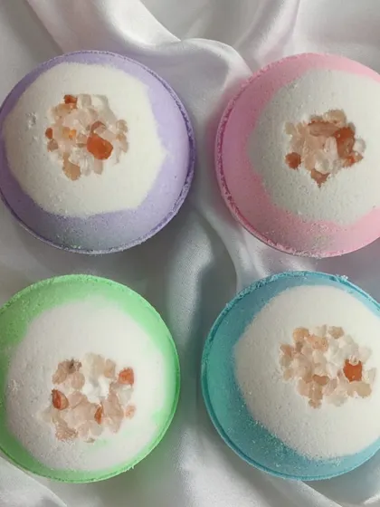 Relax and unwind with our rock salt bath bombs. These are designed to soothe sore muscles and detoxify the skin, available in a variety of colors and fragrances.