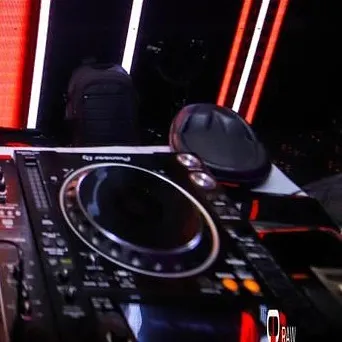 My headphones resting on the decks, waiting for the next track. A classic DJ shot.