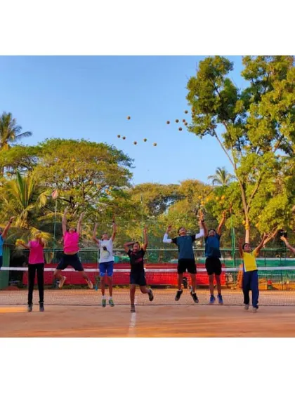 The pure joy of tennis. Our players celebrating after a fun session, showcasing the positive and energetic spirit of our community.