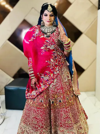 This bride looks powerful and elegant. The full bridal attire, complete with makeup and jewelry, creates an unforgettable image.