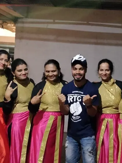Backstage with another group of wonderful ladies. I make sure everyone feels supported and confident before they step into the spotlight for their festival performance.