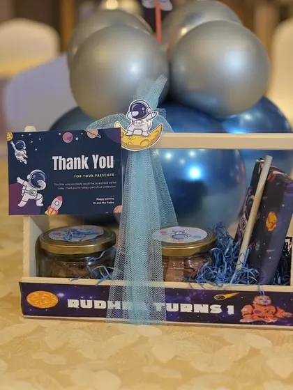 Out-of-this-world party favors for a space-themed birthday, thanking guests for joining the cosmic adventure.