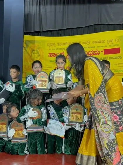 Our little stars receiving their awards and certificates at a dance competition.