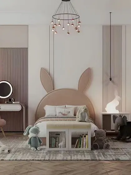 A whimsical girl's room with a bunny-eared headboard, a vanity table, and soft, warm lighting.
