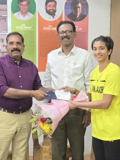 Our star player, Malvika Bansod, being felicitated by local dignitaries, including the OSD to the CM of Maharashtra, for her international achievements.