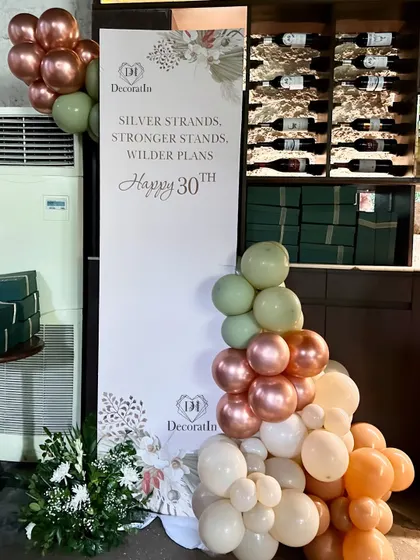 A close-up of the balloon garland detail on the welcome sign.