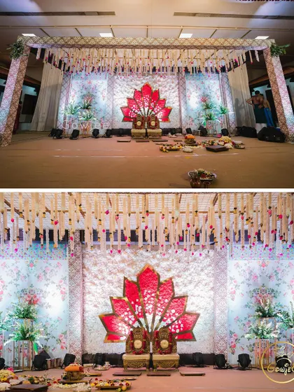Another view of the beautiful wedding stage with its prominent red lotus motif and hanging floral decor.