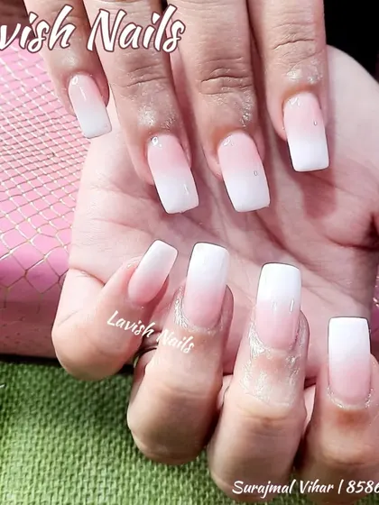 A clean and crisp ombré manicure on square nails, a popular and versatile choice for brides.