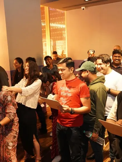 A fun moment during one of our party games, with participants laughing and enjoying the activity.