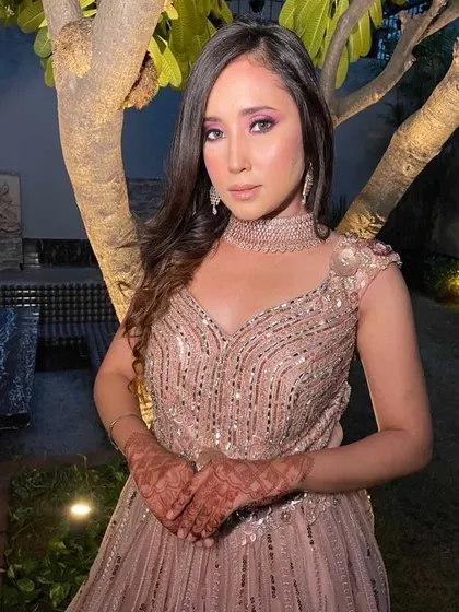 This happy client is ready for a wedding reception in a sparkling gown and a beautiful American Diamond choker. Renting makes it easy to have the perfect jewellery for every occasion.