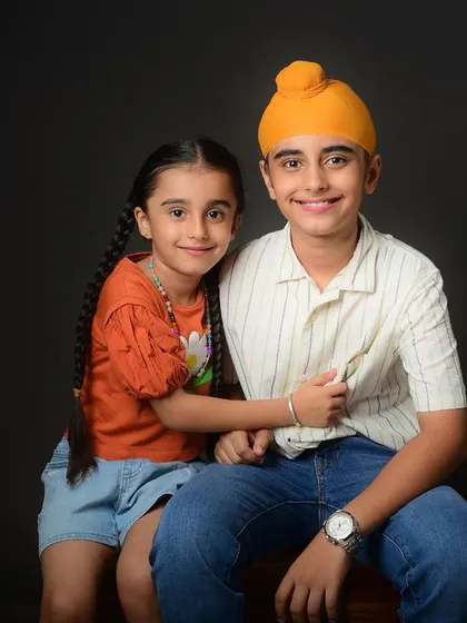 A wonderful brother and sister portrait from a family session at my Gurgaon studio. Their smiles show their close bond.