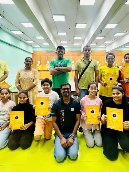 More happy campers and their parents posing with coaches after a camp session. I encourage parental involvement and make sure they see the progress their children are making.
