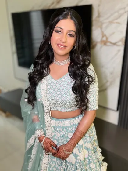 Twisha all dolled up for her engagement. A perfect example of minimal makeup at its best, with soft smokey eyes and a nude lip.