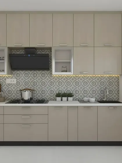 A neutral-toned kitchen with a beautiful patterned backsplash that adds personality. The layout is designed for an easy and efficient workflow.