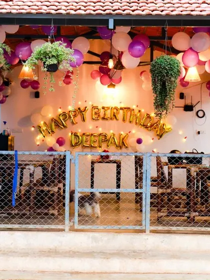 A wider view of the restaurant setup, showing how our decorations can transform a section of a public space into a private celebration area.