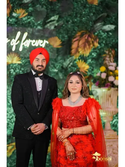 A classic portrait of the couple at their engagement party.