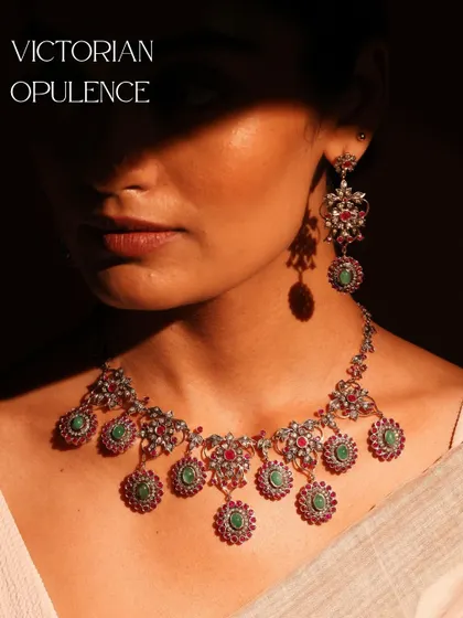 Inspired by a bygone era of grandeur, the Victorian Opulence set is perfect for traditional celebrations. It features an intricate design of rubies, emeralds, and diamonds with a classic, regal feel.