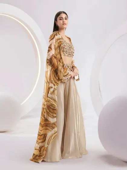 A side view of the Adoree Cape Set, showing the graceful movement and length of the stunning printed cape.