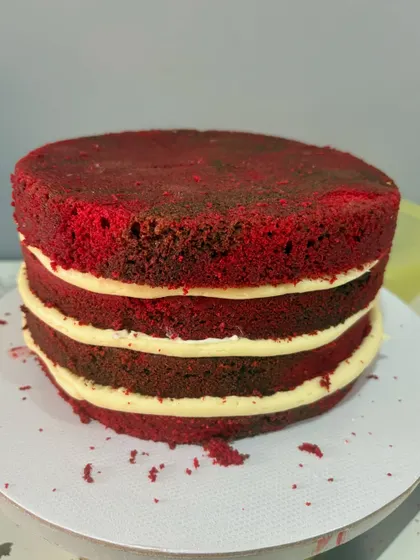 The layers of a custom Spider-Man cake in the making. I used my popular red velvet recipe to match the theme, ensuring the cake tastes as good as it looks.