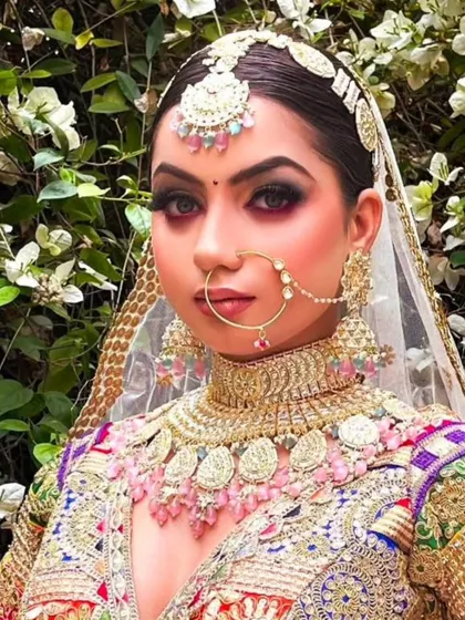 A unique and colorful bridal look. The model wears a multi-colored jewellery set that perfectly complements her vibrant lehenga.