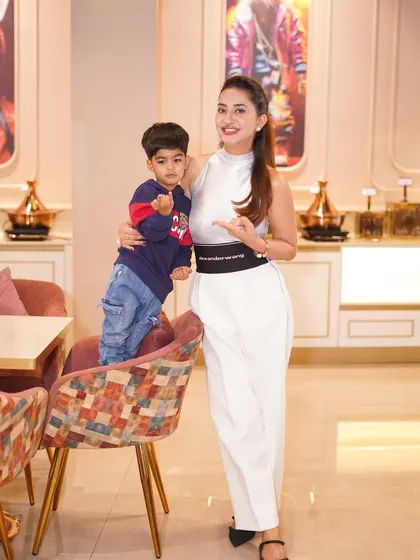 A happy client posing with her son at his birthday party. Her public shoutout praising our execution from theme to activities is the highest compliment we can receive.