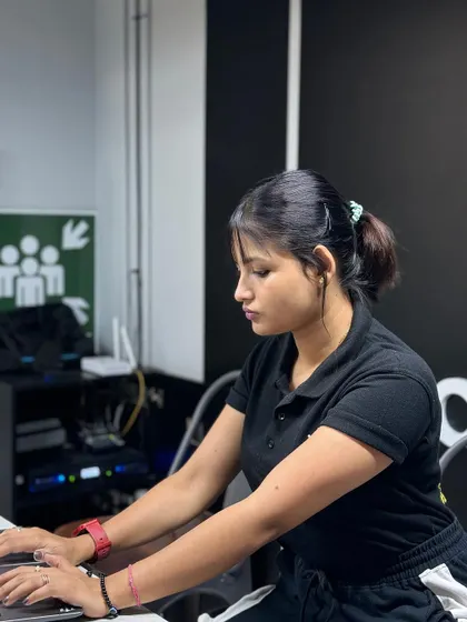 Even trainers have desk work. Here I am planning workout schedules and programs for my clients at the Cult.fit center.
