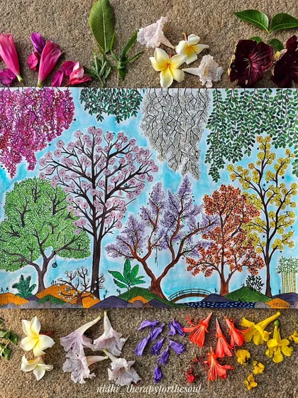 My Bangalore spring painting decorated with real flowers that inspired the artwork. This shows the direct connection between my art and the nature around me.