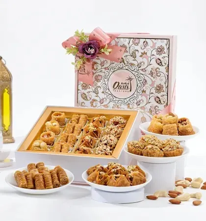 The same Royal Delight Hamper, this time in a beautiful pink floral box. We offer various packaging designs to match the theme of your celebration.