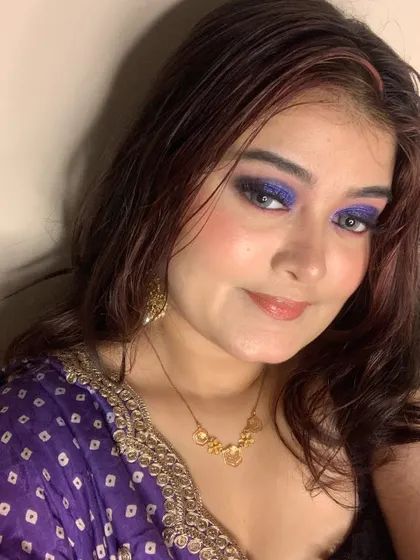 A final look at the complete purple smokey eye makeup.