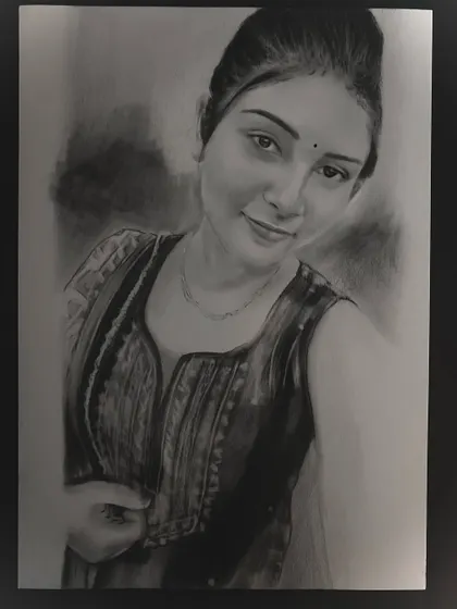 A charcoal sketch capturing a woman's gentle smile and the soft texture of her clothing.