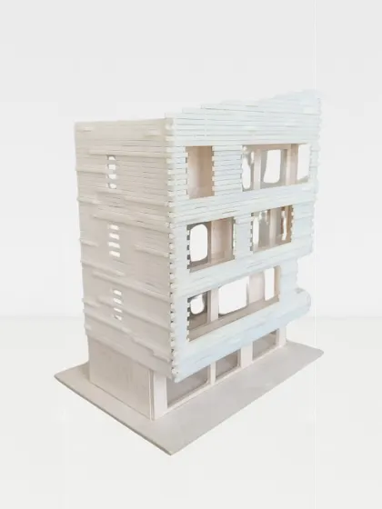 This model explores a more complex, layered facade. The tactile process of model-making allows for intuitive adjustments and a deeper understanding of how light and shadow will interact with the building's skin.