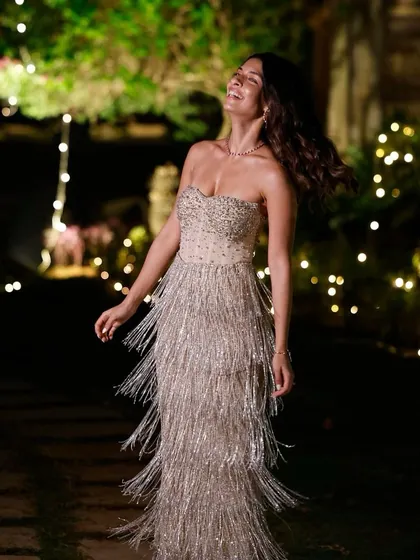 A real TMJ bride, Maia, adorned in our versatile Ruby & Diamond necklace, designed to be cherished on multiple occasions.