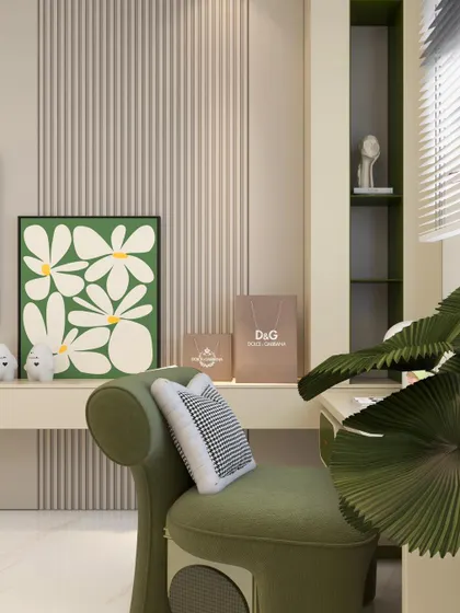 A close-up of the styling, featuring a modern green chair and playful art, perfect for a child's creative space.