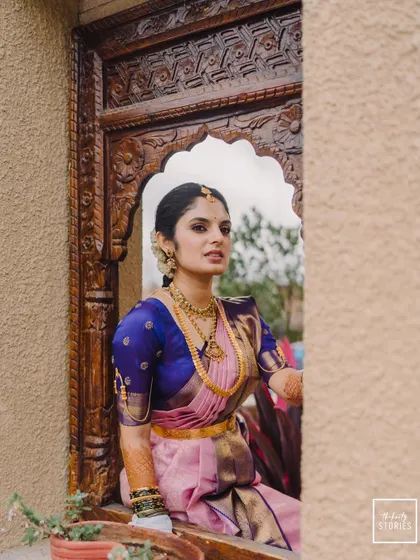 A duplicate of 275, another angle of the bride framed by the beautiful window.