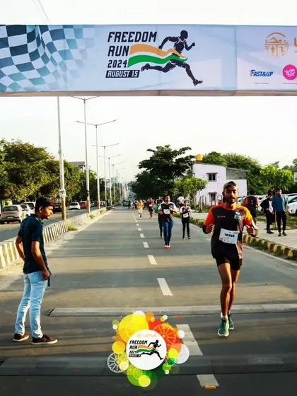 A runner approaches the finish line of the Freedom Run 2024, ready to complete the challenging race.