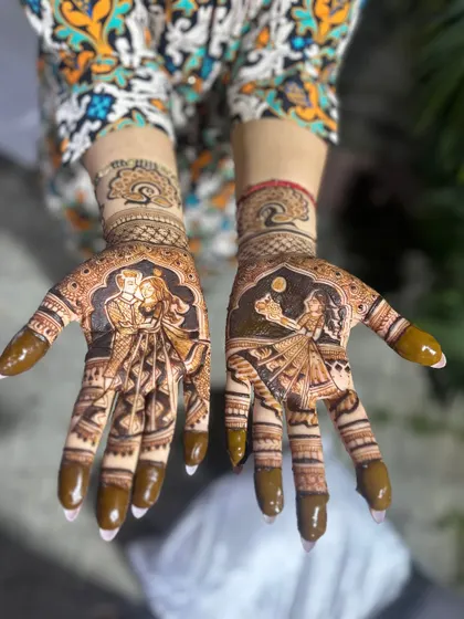 A romantic Karwa Chauth design with a couple portrait and a woman looking at the moon.