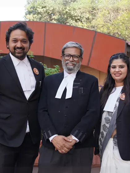 Standing proudly with two of my colleagues. Every member of this bar, regardless of age or gender, is a vital part of our community. It is an honour to stand with them in our shared mission.