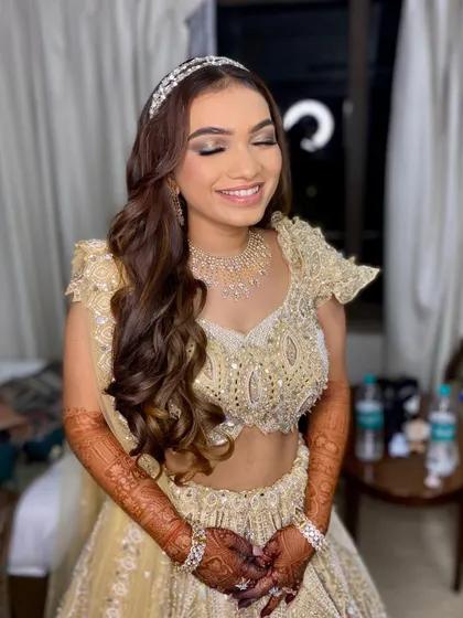 Sparkling and ready for her sangeet! I created this beautiful glam look with a focus on shimmering eyes and glowing skin, topped with a princess-style headband.