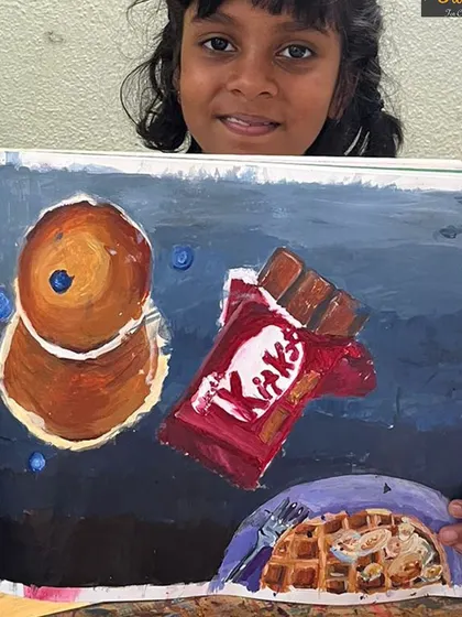 Another fantastic submission for our light and shadow assessment. This student chose a darker, more dramatic background to make the food items stand out.