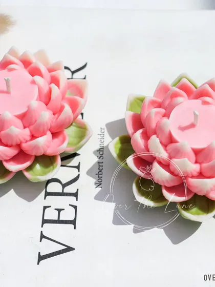 A pair of my vibrant pink Lotus candles. They are perfect for gifting or creating a symmetrical decor arrangement for the festive season.